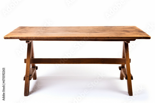 Wooden table with long wooden top and legs on white background.