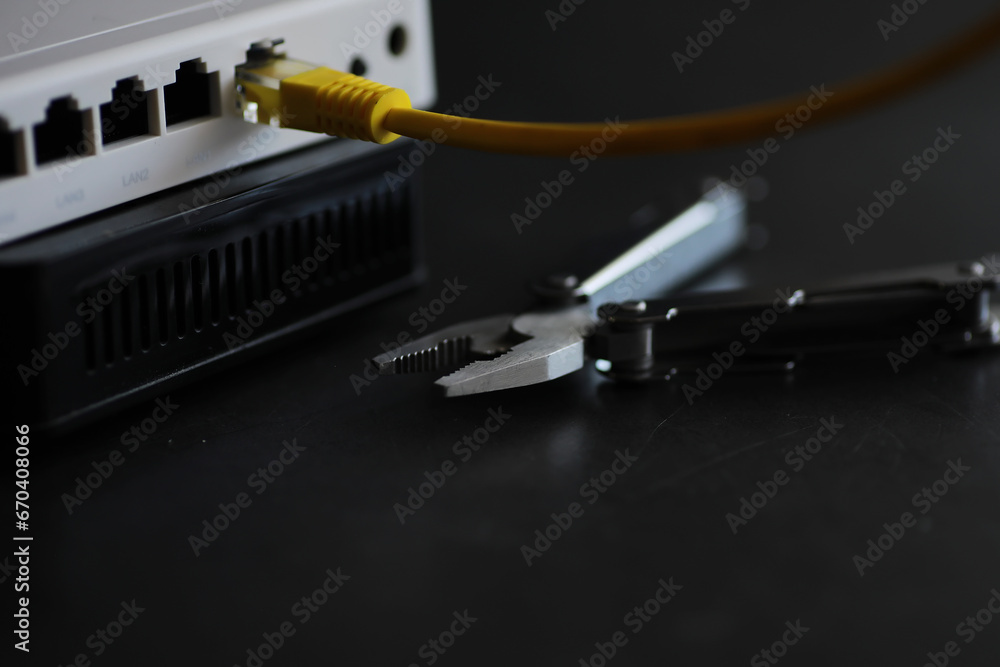 Modern dual band wireless router. Man working in the background. Fast and wireless internet concept. Modern dual band wireless router. Man working in the background. Fast and wireless internet concept.