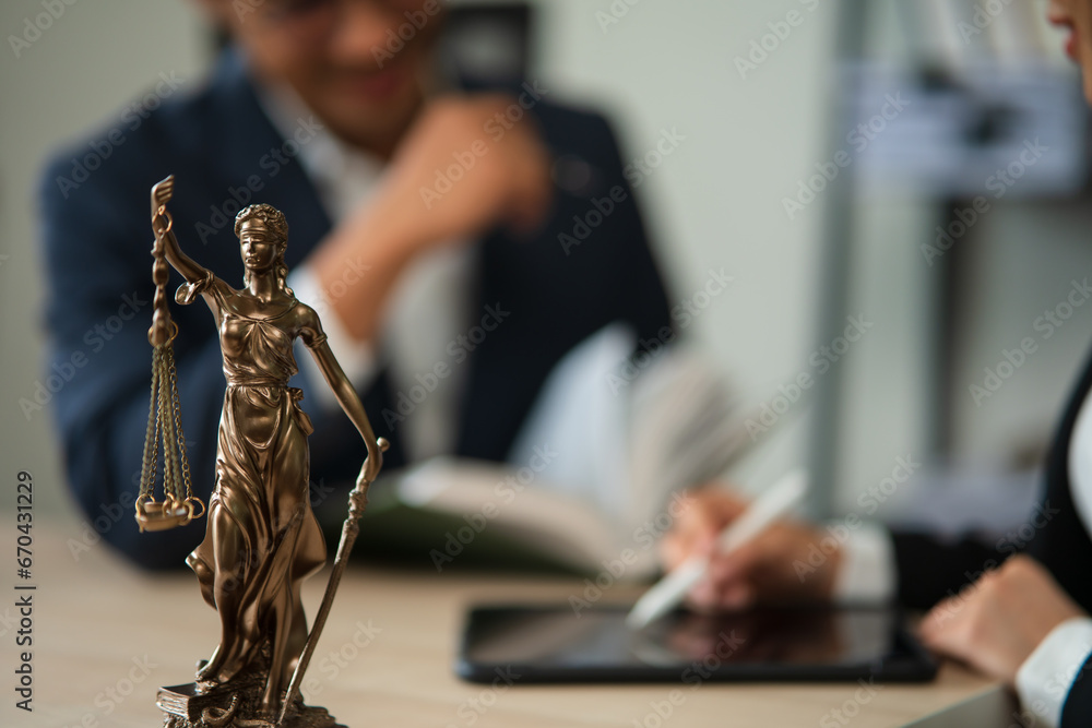 Fototapeta premium Partner lawyers or attorneys discussing a contract agreement. Successful businessmen have a contract in place to protect it,signing of modest agreements form in office...
