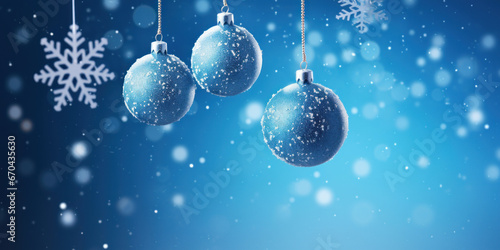 Blue Christmas balls on blurred blue background