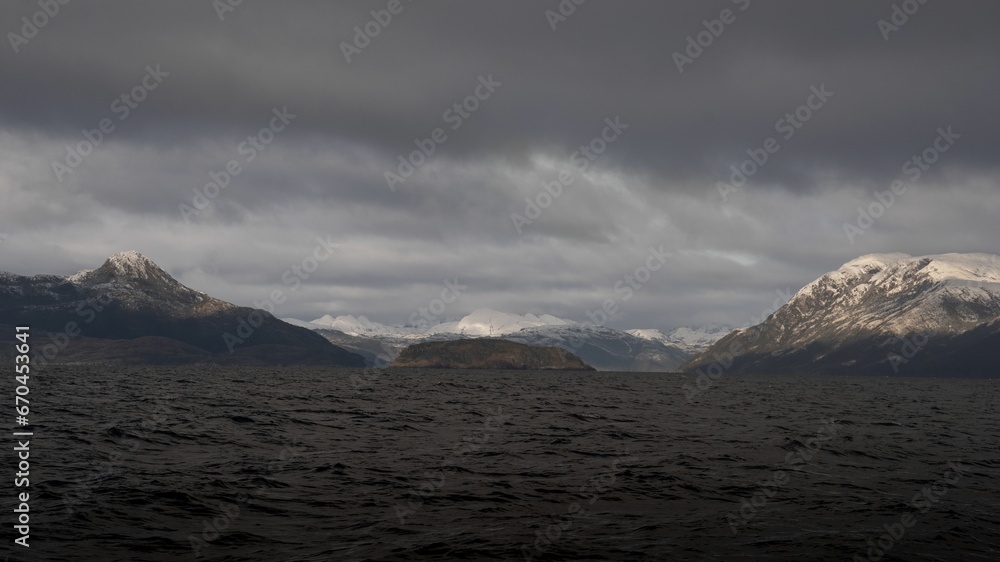 Majestic scene of Patagonian fjords surrounded by towering mountains