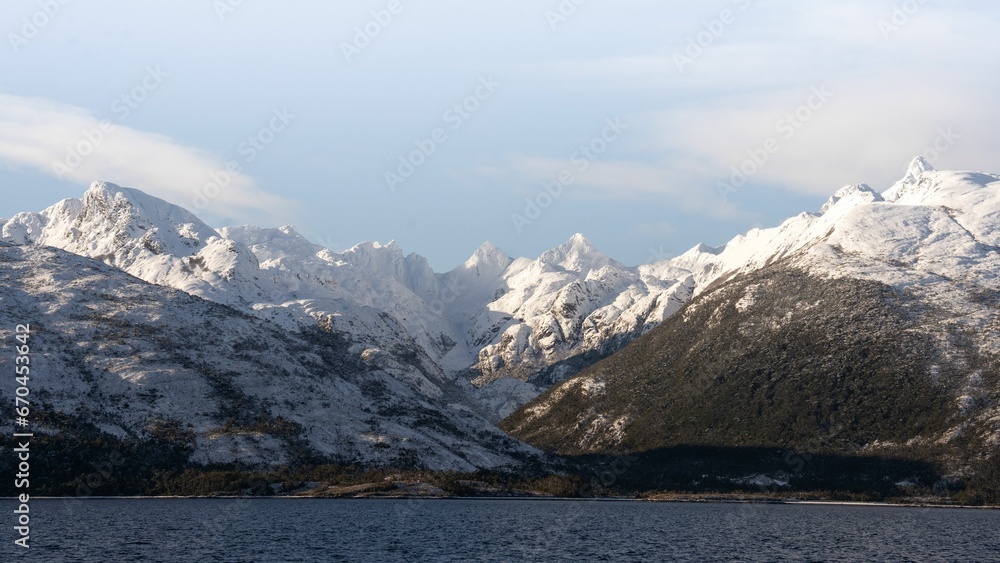 Majestic scene of Patagonian fjords surrounded by towering mountains