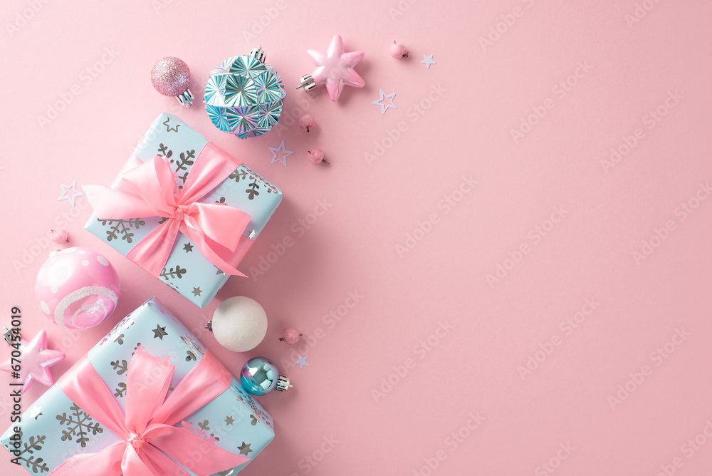 Chic New Year setting. Top-down view of decorations, balls, stars, cute gift boxes tied with ribbons, mistletoe berries on a soft pastel pink backdrop with a blank area for text or promotional content Chic New Year setting. Top-down view of decorations, balls, stars, cute gift boxes tied with ribbons, mistletoe berries on a soft pastel pink backdrop with a blank area for text or promotional content