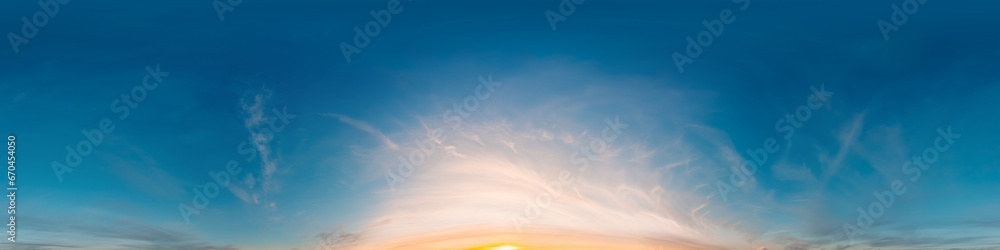 Sunset sky panorama with golden pink Cirrus clouds. Seamless hdr spherical 360 panorama. Sky dome in 3D visualization, sky replacement for aerial drone 360 panoramas. Weather and climate change