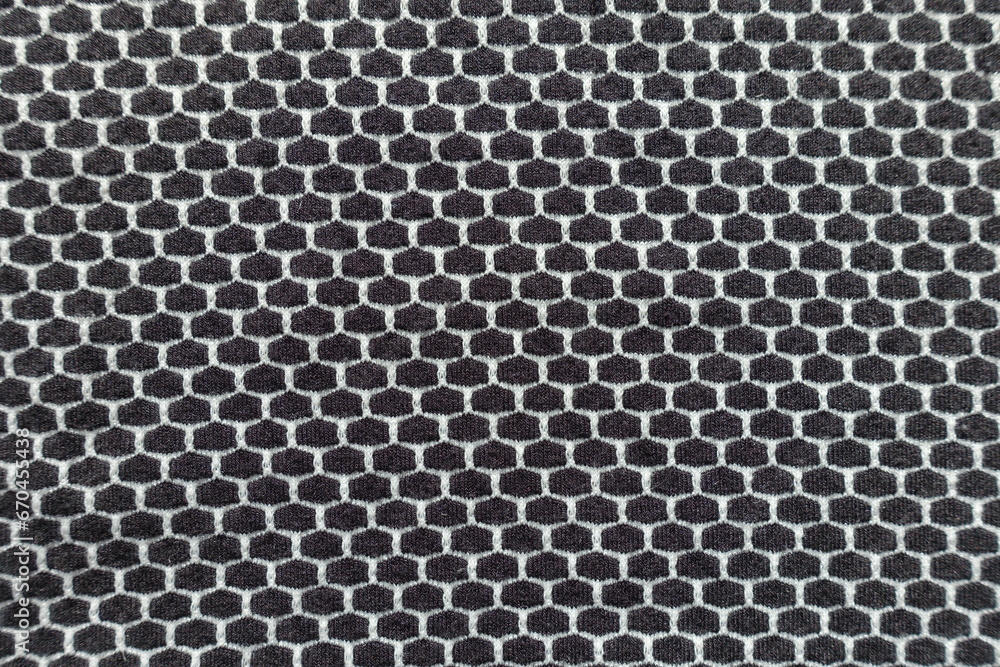 Top view of black and white jersey fabric with honeycomb pattern Top view of black and white jersey fabric with honeycomb pattern