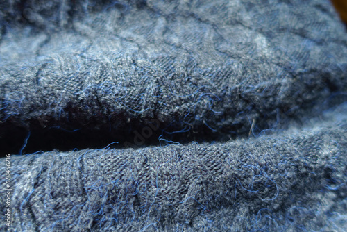 Folded dark navy blue knitted woolen fabric