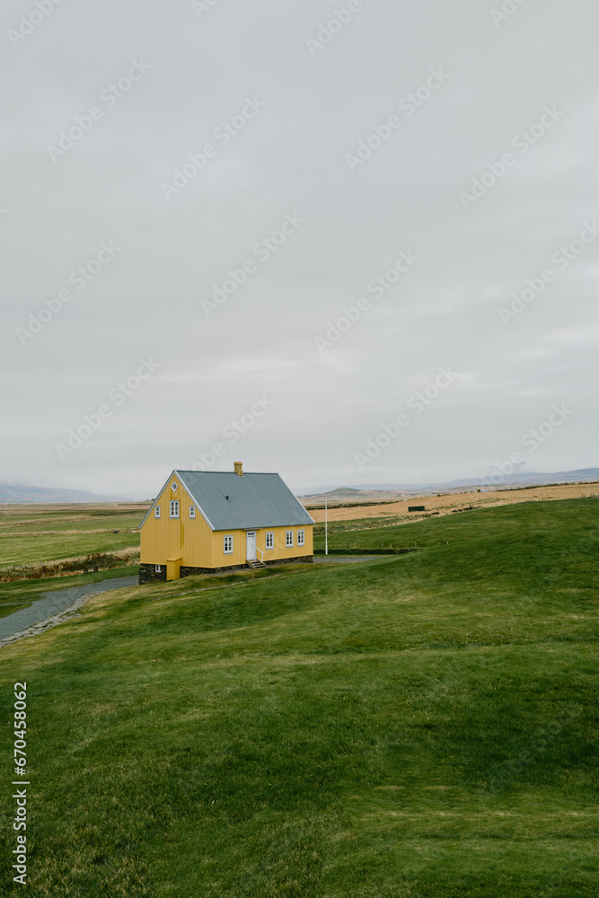 Yellow House in the countryside landscape in Iceland