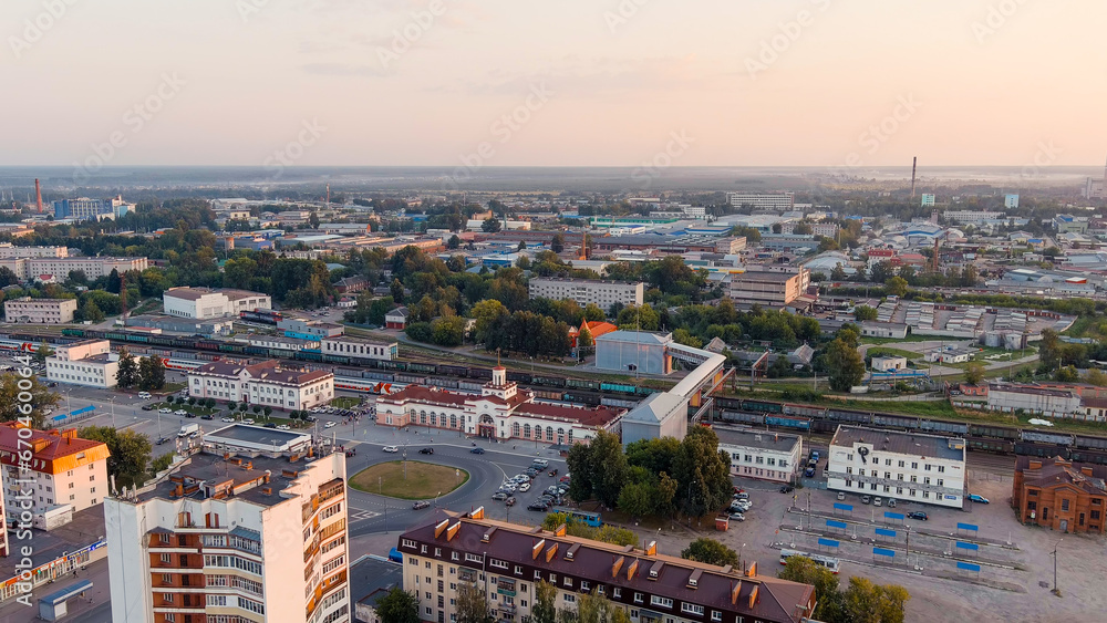 Yoshkar-Ola, Russia - September 24, 2022: Train Station. Panorama of the central part of the city from the air during sunset, Aerial View