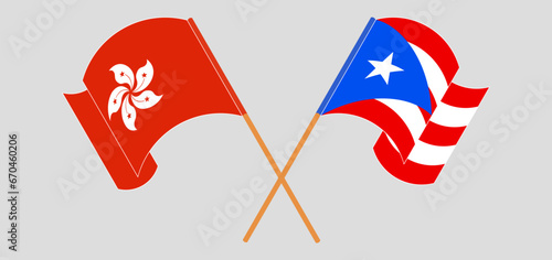 Crossed and waving flags of Hong Kong and Puerto Rico