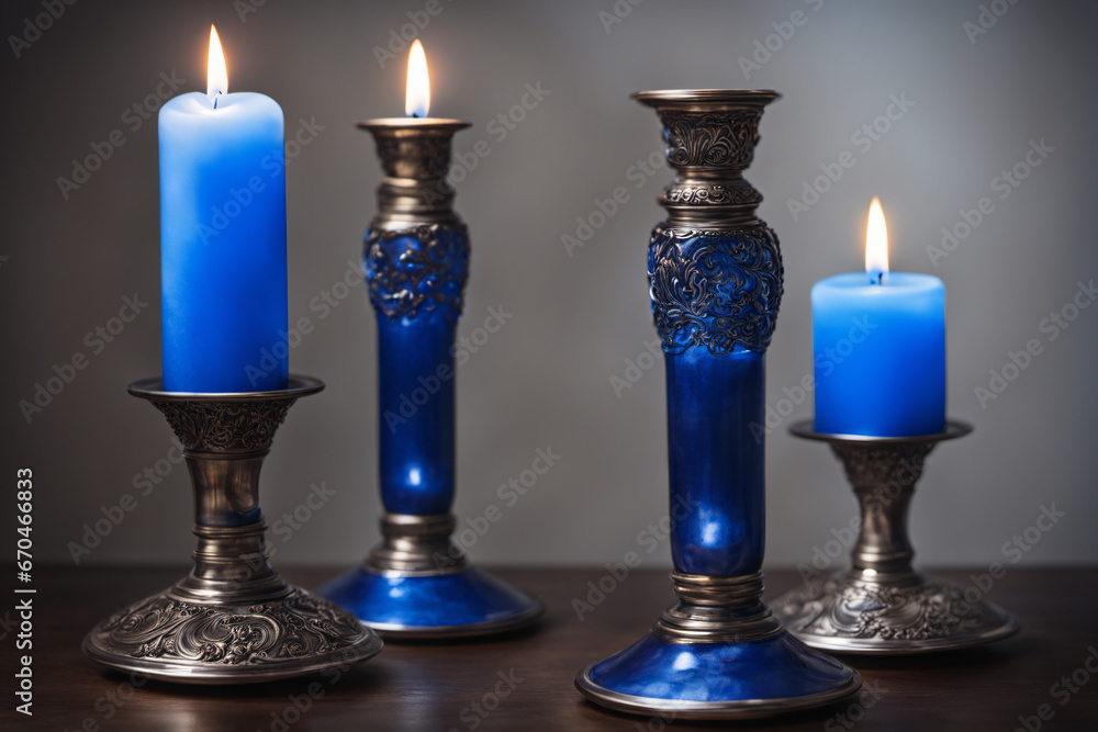 Close-up of a blue candlestick lit for a mysterious ceremony Close-up of a blue candlestick lit for a mysterious ceremony