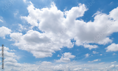 Panoramic view of clear blue sky and clouds  Blue sky background with tiny clouds. White fluffy clouds in the blue sky. Captivating stock photo featuring the mesmerizing beauty of the sky and clouds.