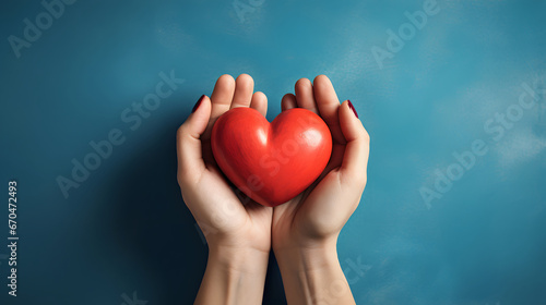 hands holding red heart  health care  love