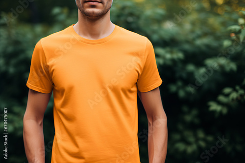 A Stylish Men's Orange T-shirt Mockup, Perfect for Cozy Comfort and Fashion Forward Chicness © Andrii Fanta