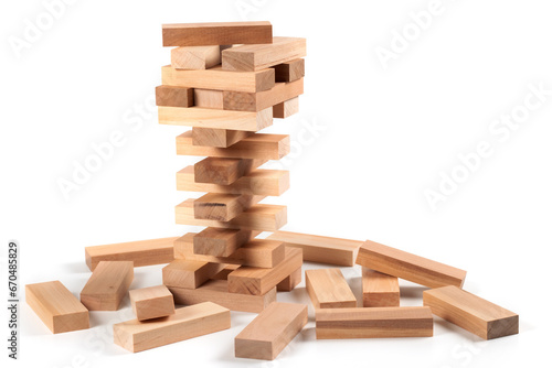 A game of logic and the ability to think. Jenga tower with wooden blocks on a white background.