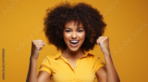 Young african american woman with afro hairstyle and casual yellow shirt on yellow background Generative AI