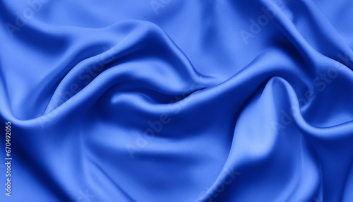 The smooth silk satin surface in a deep blue hue exudes luxury and elegance.