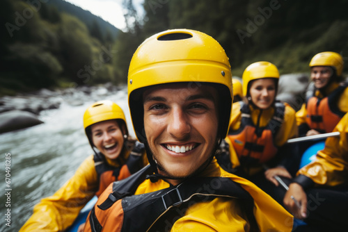 Portrait of a group of happy young people rafting. Extreme sport photo