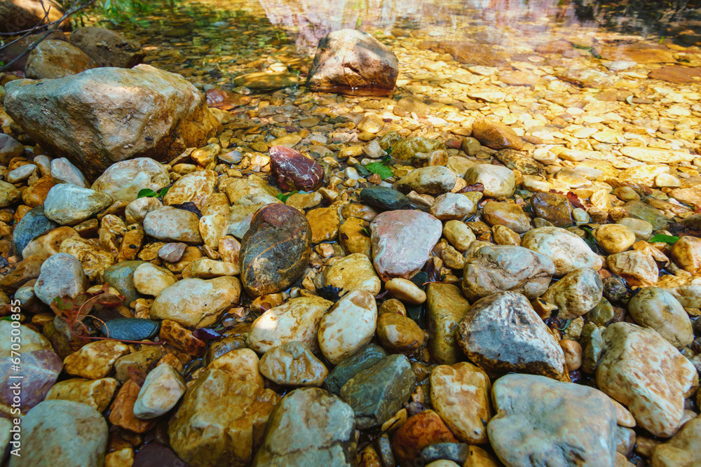 closeup of pond with rocks, beautiful summer landscape closeup of pond with rocks, beautiful summer landscape