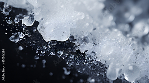 Melting ice on a black background. Close up. Macro.