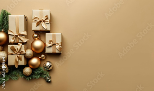 Fotografie, Tablou Four gift boxes with golden bows, balls and fir branches on empty background in khaki tones, top view