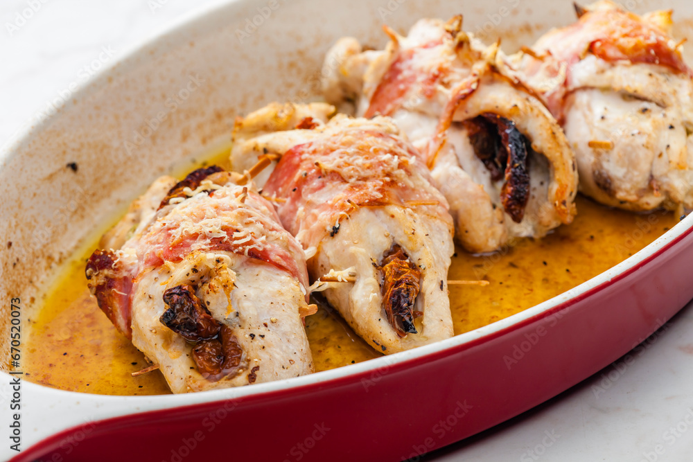 chicken rolls stuffed with dry tomatoes in bacon chicken rolls stuffed with dry tomatoes in bacon