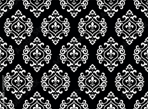Wallpaper in the style of Baroque. Seamless vector background. White and black floral ornament. Graphic pattern for fabric, wallpaper, packaging. Ornate Damask flower ornament