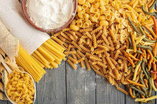 composition of raw Italian pasta, different type and shape of pasta and spaghetti  photo