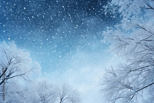 Soft snowfall against a twilight blue sky. © Jelena