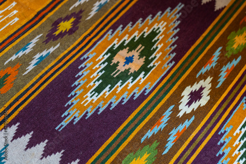 Schilderij op canvas Old woolen carpet with traditional Karelian pattern