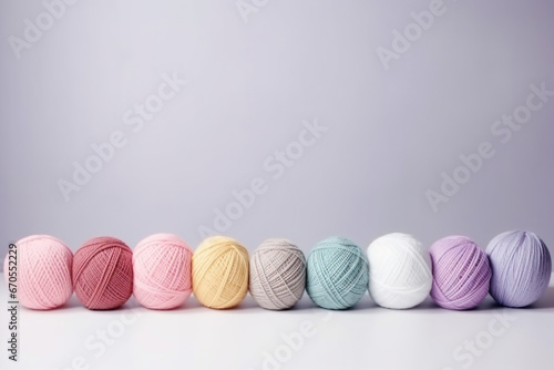 colorful pastel yarn on table with gray background photo