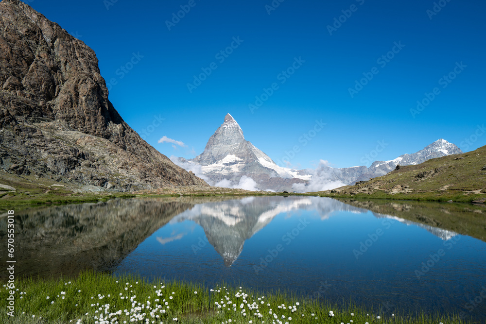 Switzerland travel - View of the Matterhorn from the Riffelsee early summer.