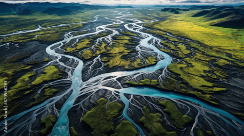 River with many meandering branches and veins, green, grey, turquoise colored background 