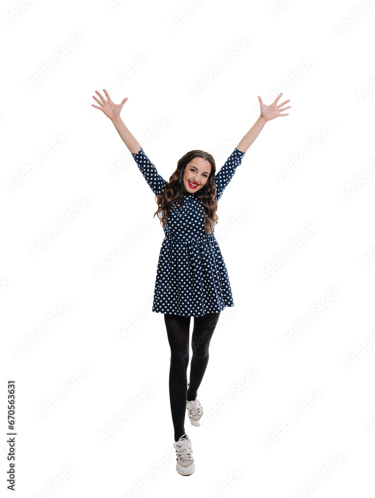 A Joyful Leap in the Sky. A woman in a polka dot dress jumping in the air A Joyful Leap in the Sky. A woman in a polka dot dress jumping in the air
