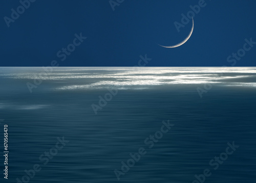 Crescent moon over ocean, Malta photo