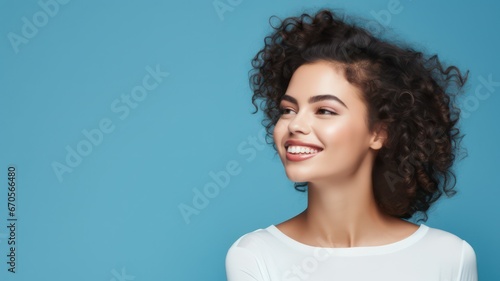 Smiling handsome young lady with hat standing on maritime blue background situated in the left corner of the image with lots of copy space on the right created with Generative AI
