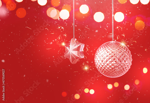 Christmas ball  star and lights on red background. Christmas and new year card. Copy space