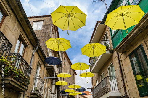Multicolored ornamental umbrellas on a street in the city of Pontevedra  in Galicia.Spain