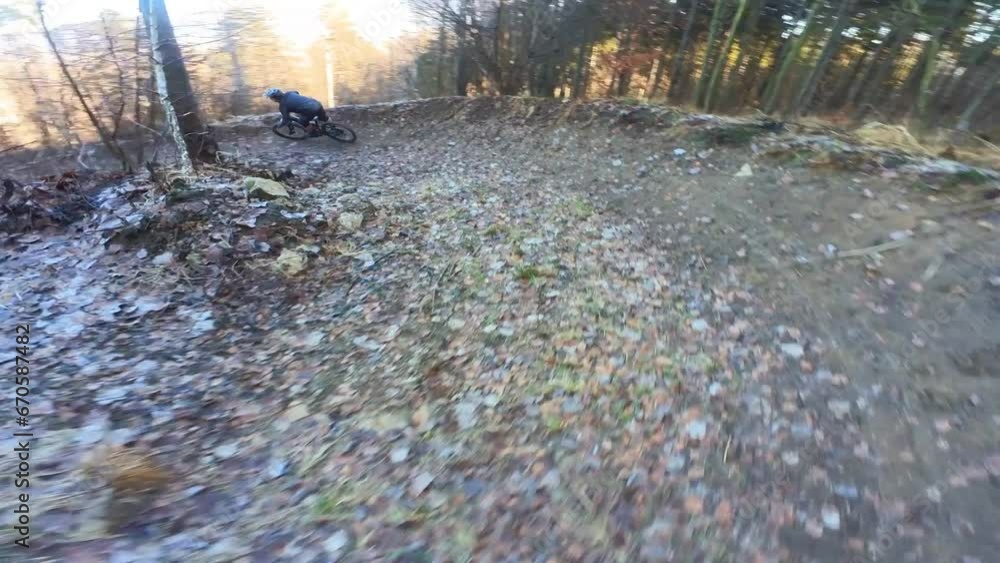 mountain bike downhill ride on a forest path with scenic autumn nature view mountain bike downhill ride on a forest path with scenic autumn nature view