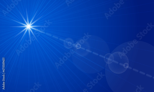 Sunray copy space with lense flare on blue background