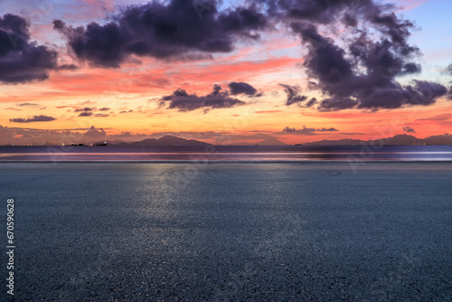 Asphalt road platform and coastline natural landscape at sunrise © ABCDstock