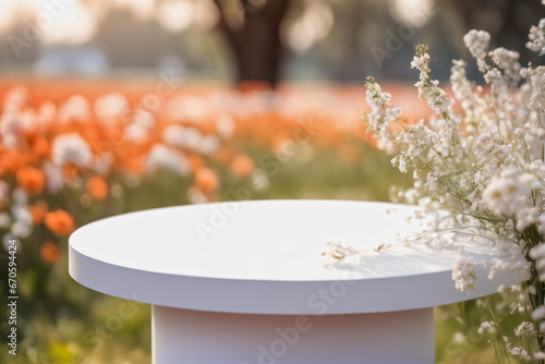 Empty White Minimalist Modern Rounded Podium with Blurred Floral Flower Field Background