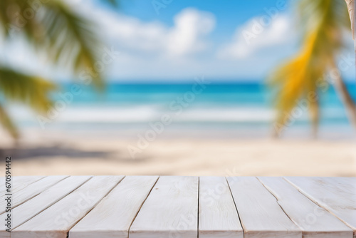 Empty White Wooden Table with Blurred Beach Background © Reytr