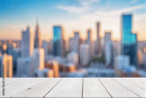 Empty White Wooden Table with Blurred City Skyscraper Scape View Landscape Background © Reytr