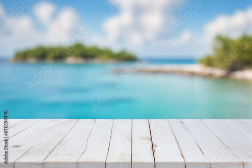 Empty White Wooden Table with Blurred Ocean and Island Background