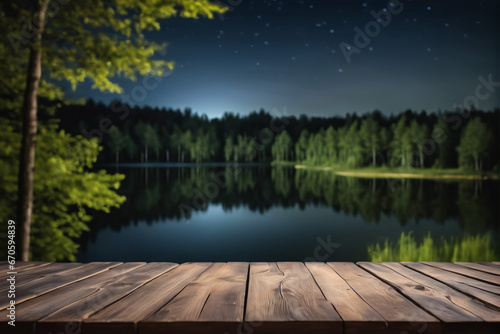 Empty Wooden Table with Lake and Forest Background at Night