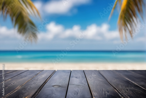 Empty Black Wooden Table with Blurred Beach Background © Reytr