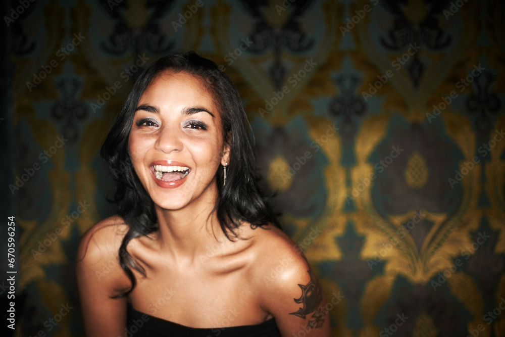 Woman, happy and laugh at nightclub in portrait, laughing and funny or enjoy at event, fun and relax. Mexican female person, smile and positive at party, energy and excited on face, comedy and club