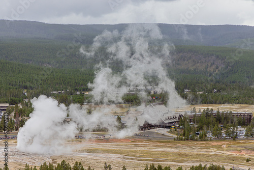 Looking over the steam clouds of Old Faithful, seen from the observation point above the geyser