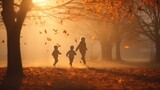 Children running and playing in the orange trees Red-brown maple leaves in the park in autumn