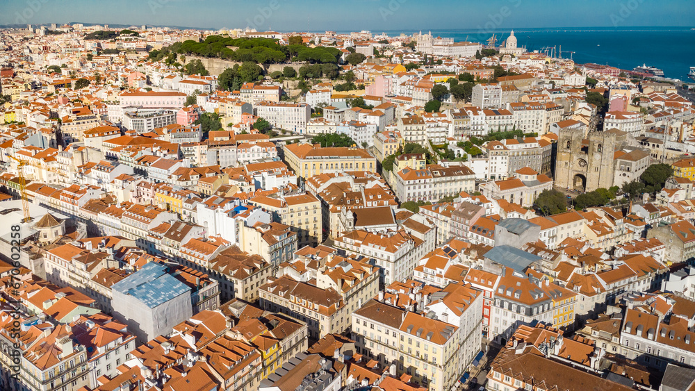 Aerial drone perspective of Lisbon - Portugal. Rooftops of Lisbon. Travel destination and capital of Portugal city visited annually by many foreign tourists.